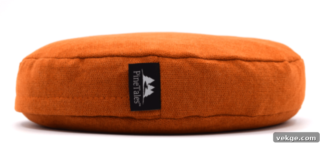 Various buckwheat pillows stacked, showcasing different sizes and covers, with a focus on natural materials.