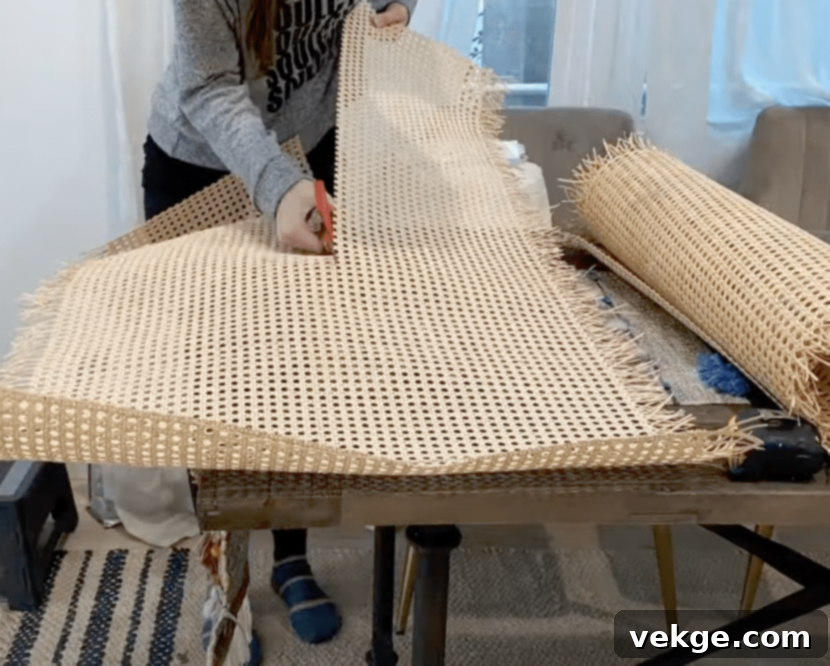Measure door openings and prepare the cane mesh, potentially soaking it to ensure proper tension.