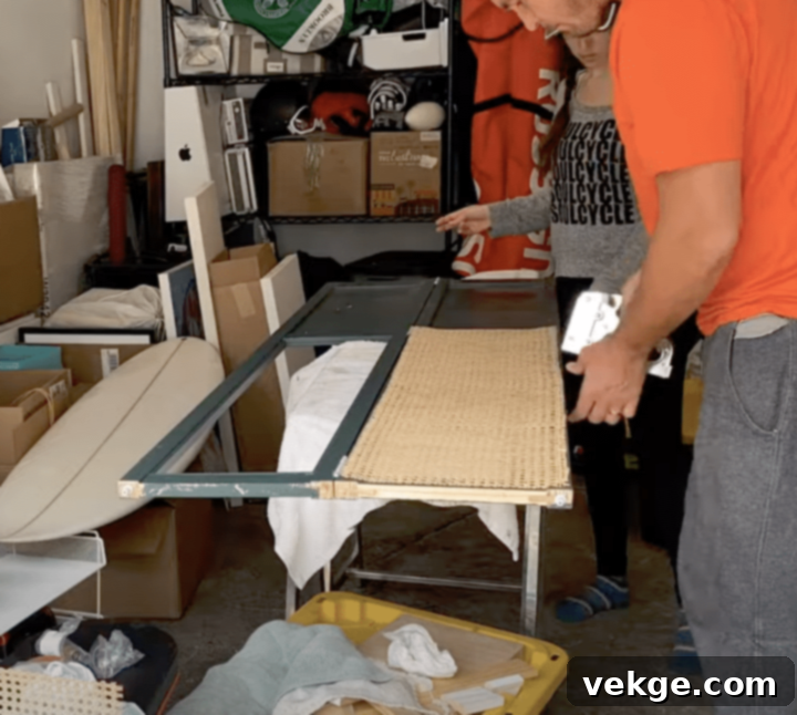 Install the prepared cane mesh on the back of the door, pulling it taut and securing with a staple gun.