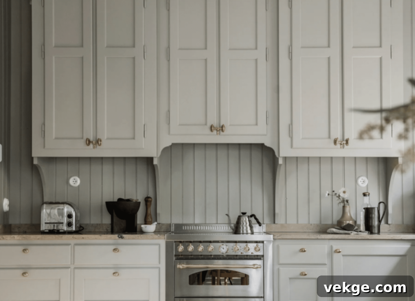 Farmhouse-style cabinets Finished off with Tone-on-Tone Shiplap for a cohesive kitchen