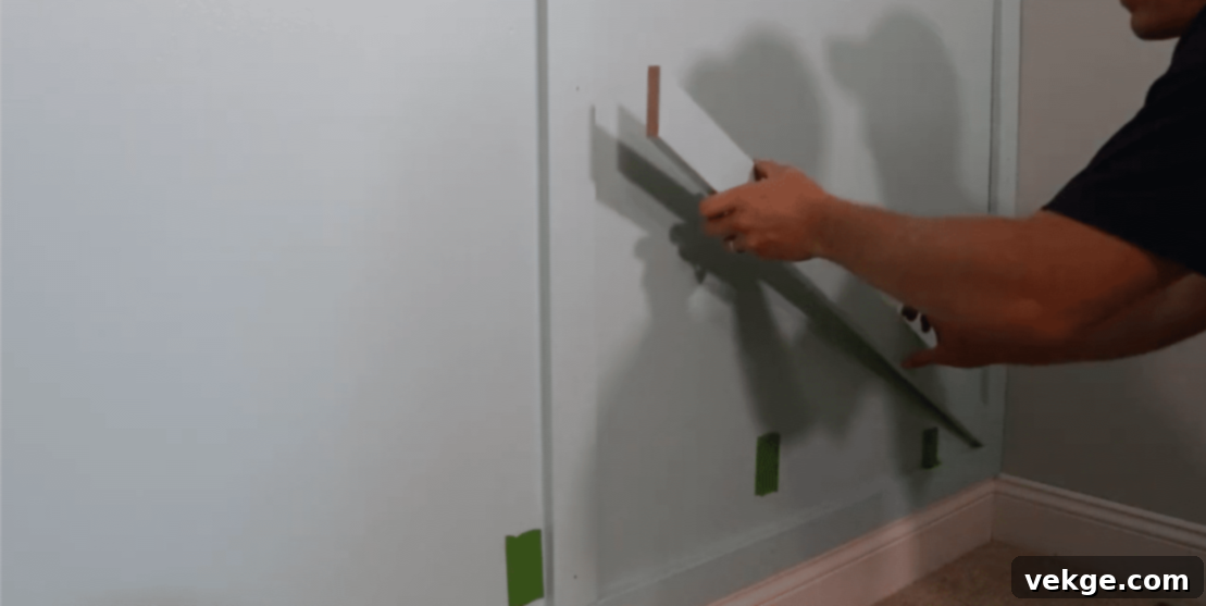 Add design elements by cutting angled pieces, nailing them into place following guidelines, and testing fit.