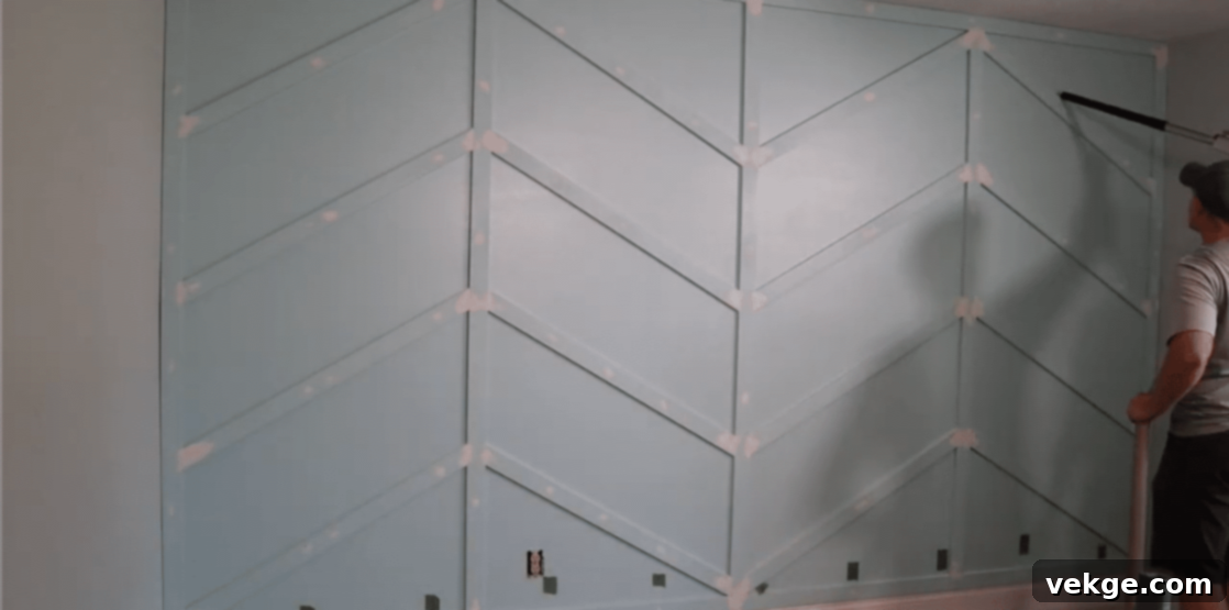 Clean up all dust and debris thoroughly after sanding, preparing the wall for final painting.