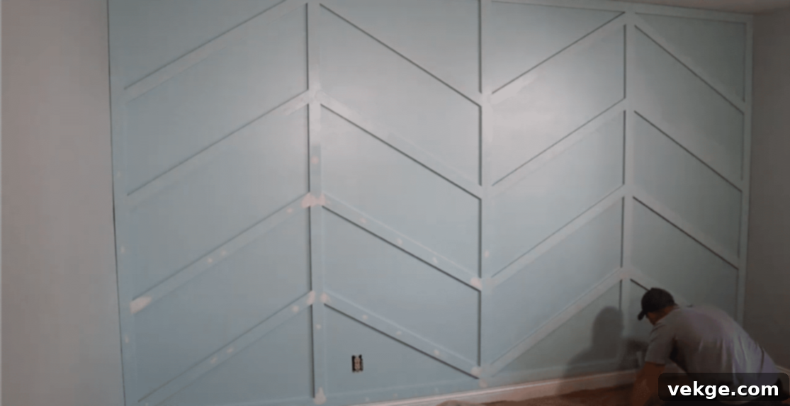 Apply 1-2 coats of paint to the trim, touching up wall paint if needed, using a mini roller for a smooth finish.