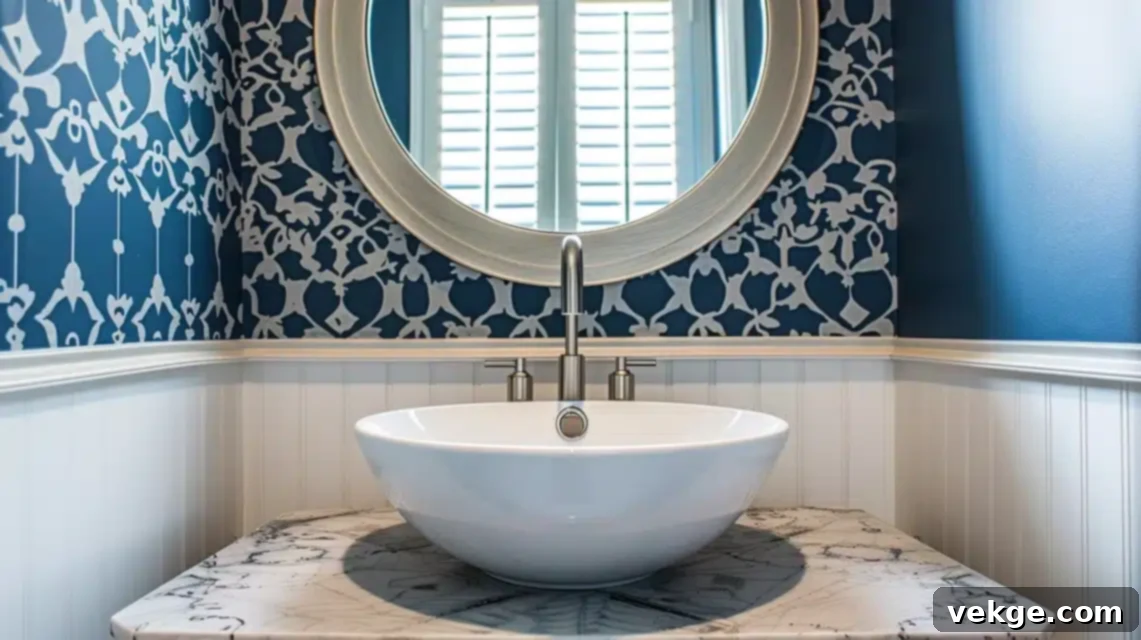 Small powder room featuring a striking graphic patterned wallpaper for a dramatic effect