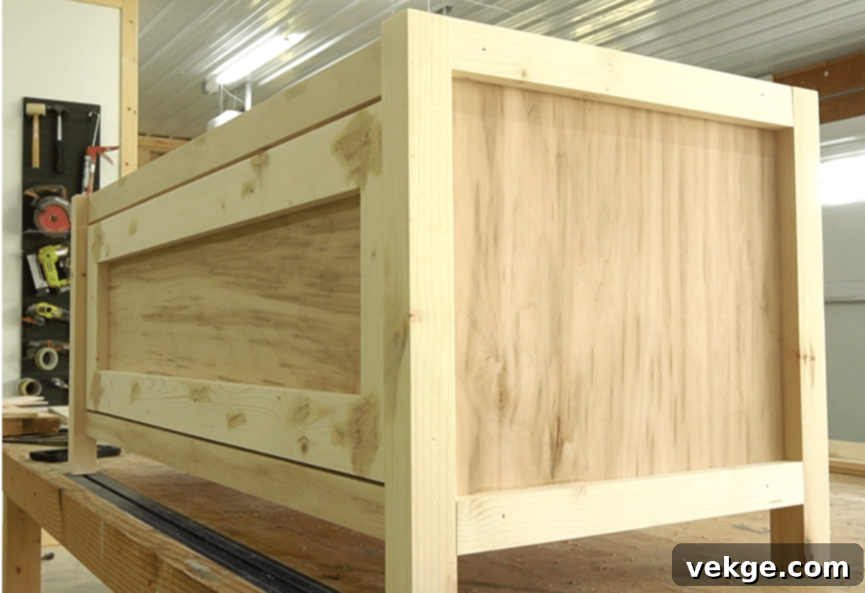 Step 6: Attach Trim and Finish, including front drawer trim, side trim, sanding, painting, and securing the top