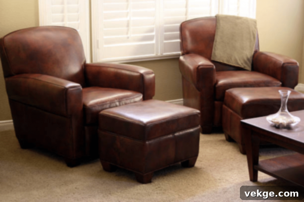 Close-up of a hand cleaning a recliner chair