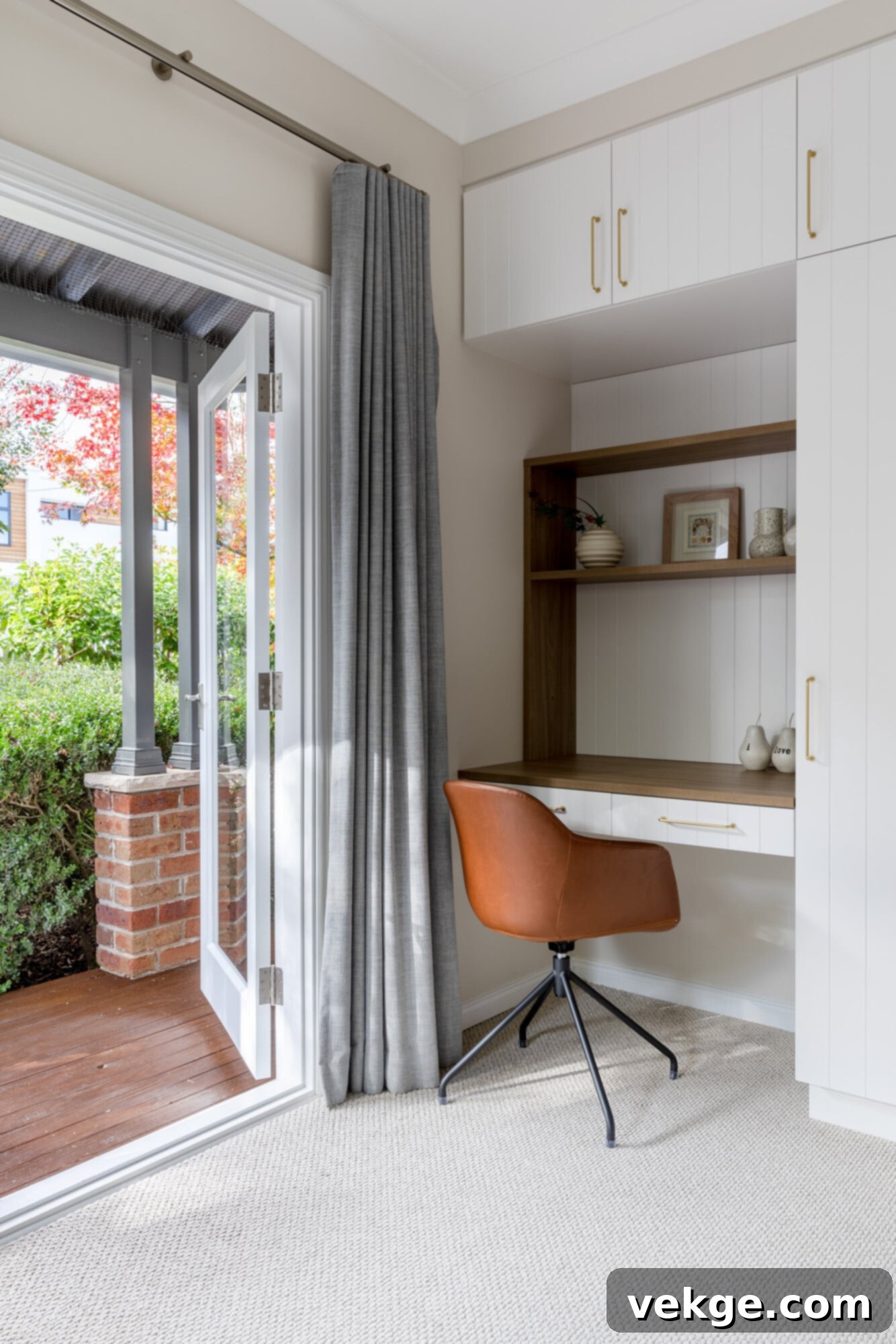 Multi-functional home office and guest room with wall bed