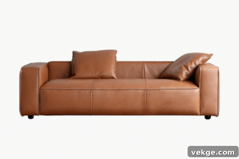 Acanva Pomona Leather Sofa in a minimalist living room setting, showcasing its clean lines and modern design.