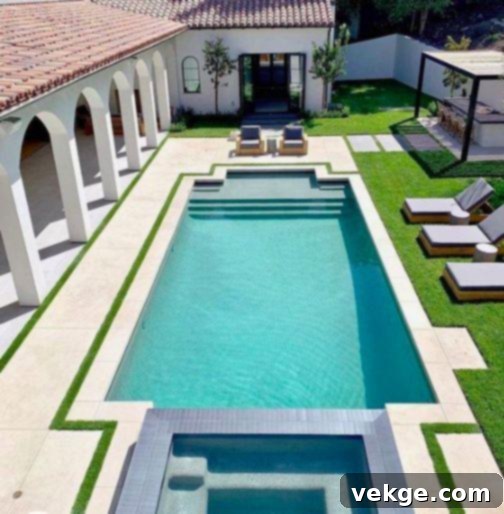 Homeowner assessing backyard for pool installation with a pool contractor