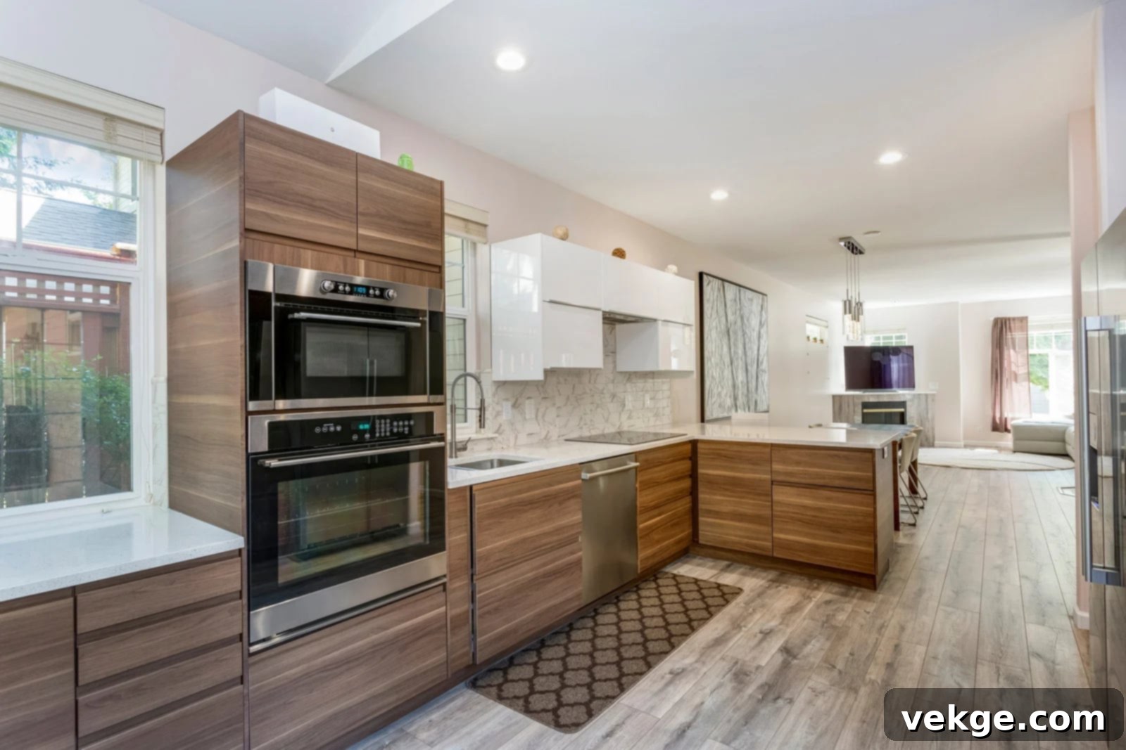 Modern luxury kitchen with integrated high-end appliances and a sleek island