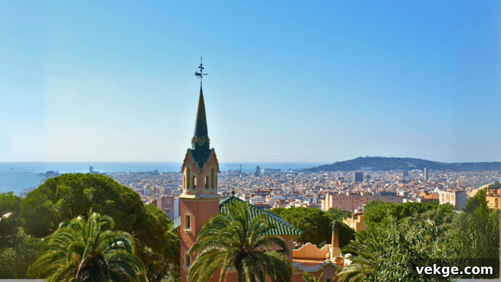 Colorful mosaic artwork and unique architectural elements in Park Guell, Barcelona, a public park designed by Gaudi.