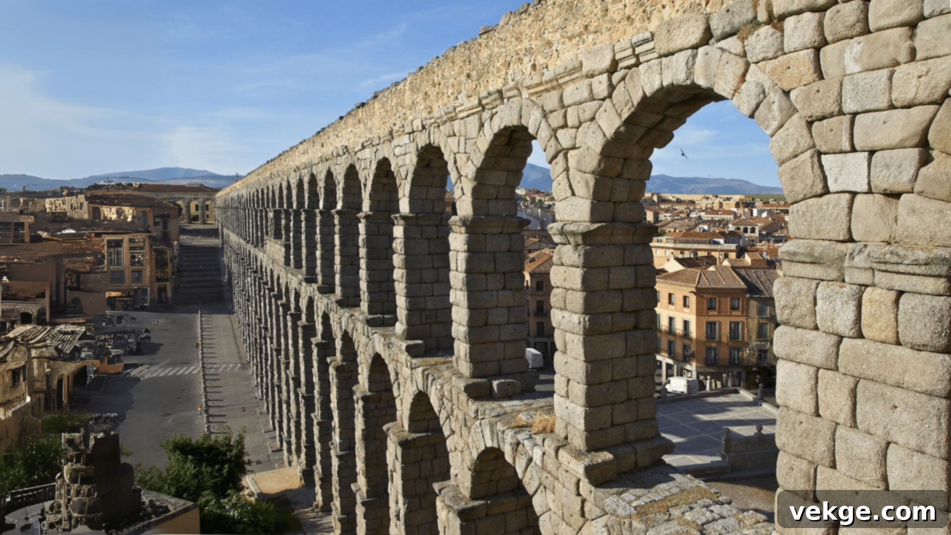 The perfectly preserved ancient Roman Aqueduct of Segovia, a towering stone structure without mortar.