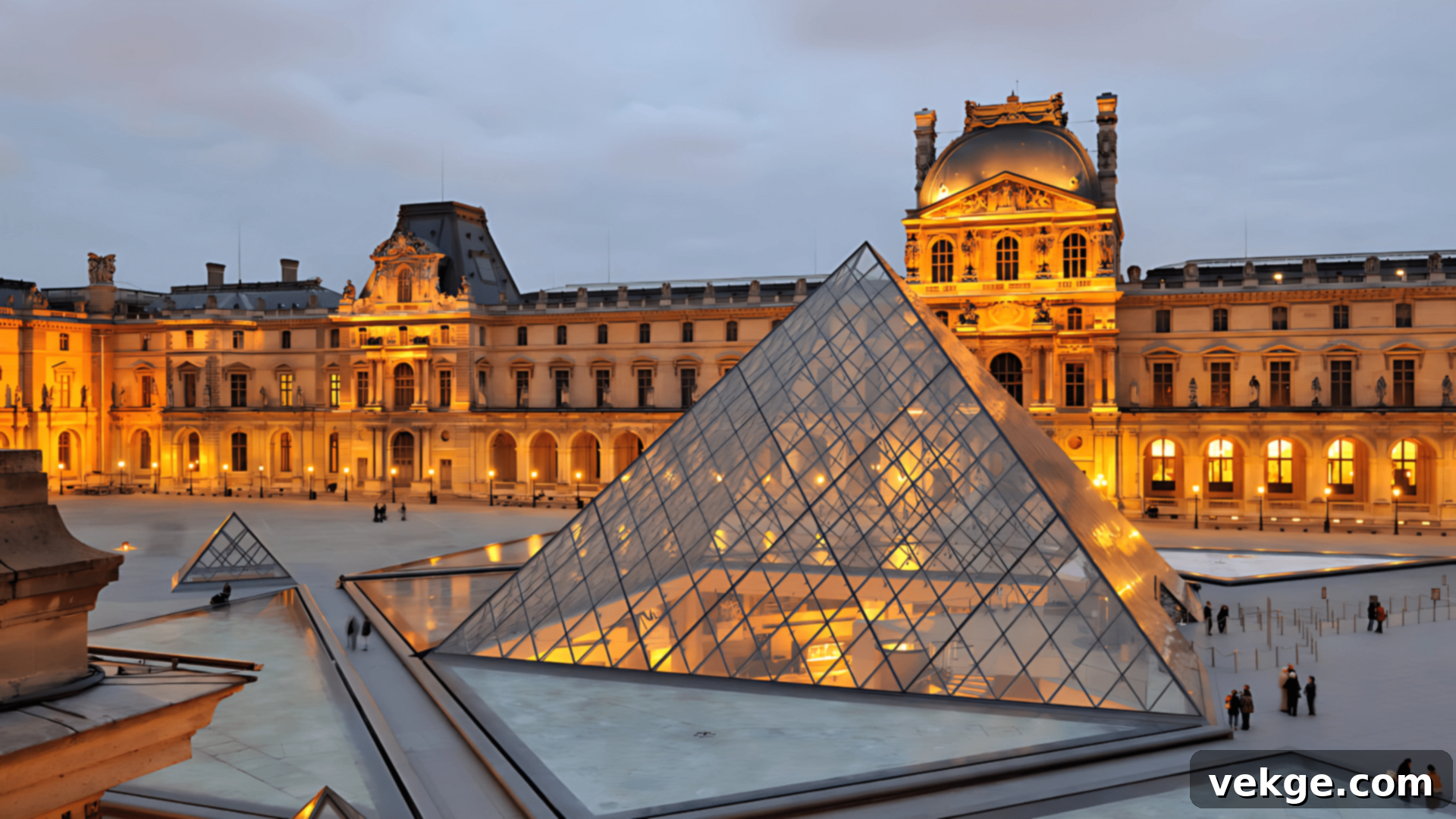 The iconic Louvre Museum with I.M. Pei's glass pyramid entrance.