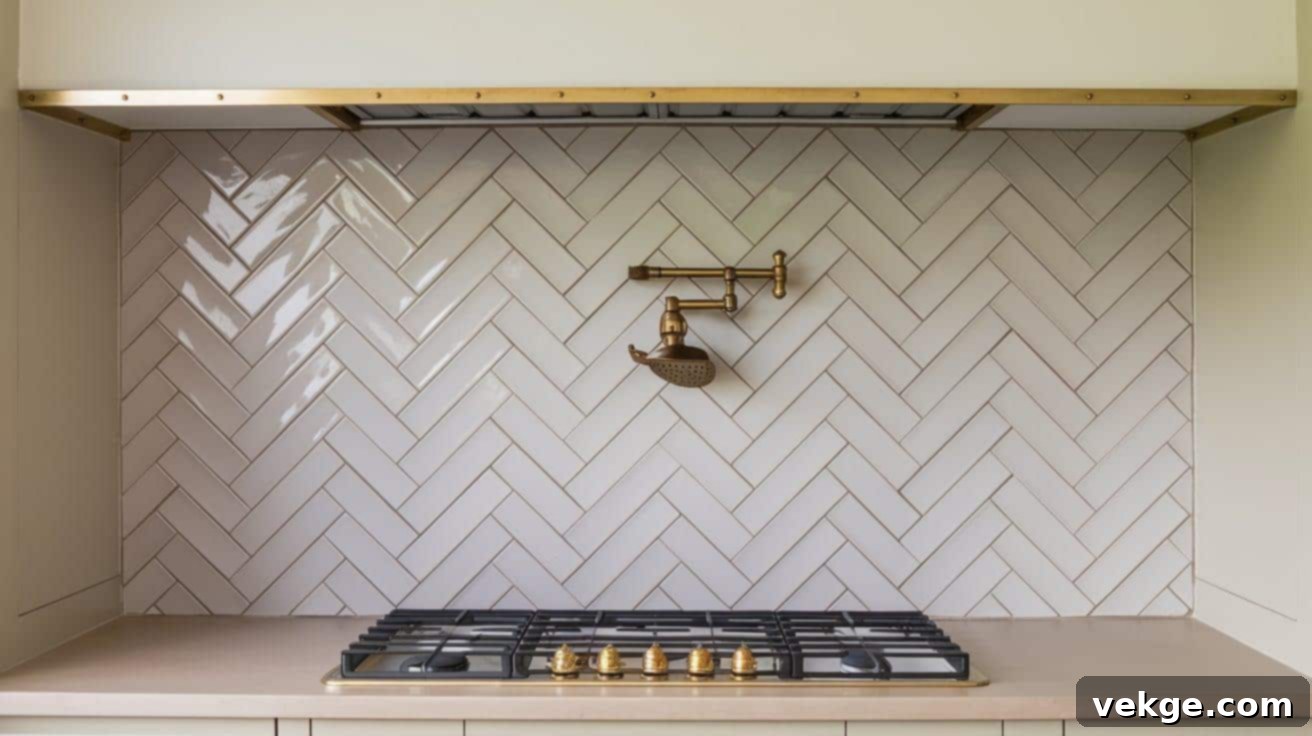 Light_Taupe_Herringbone_Tiles_with_Brass_Accents