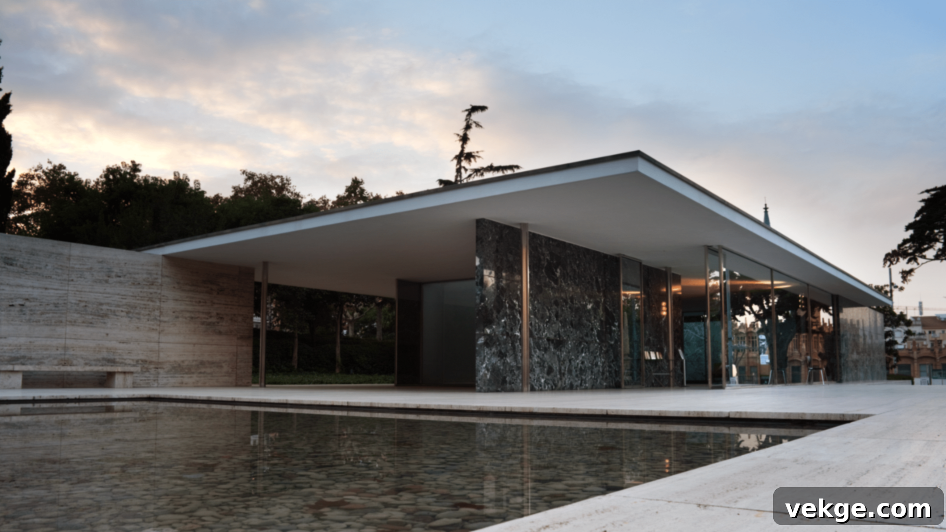 Ludwig Mies van der Rohe's Barcelona Pavilion, an influential minimalist masterpiece of modern architecture with glass, marble, and onyx walls.