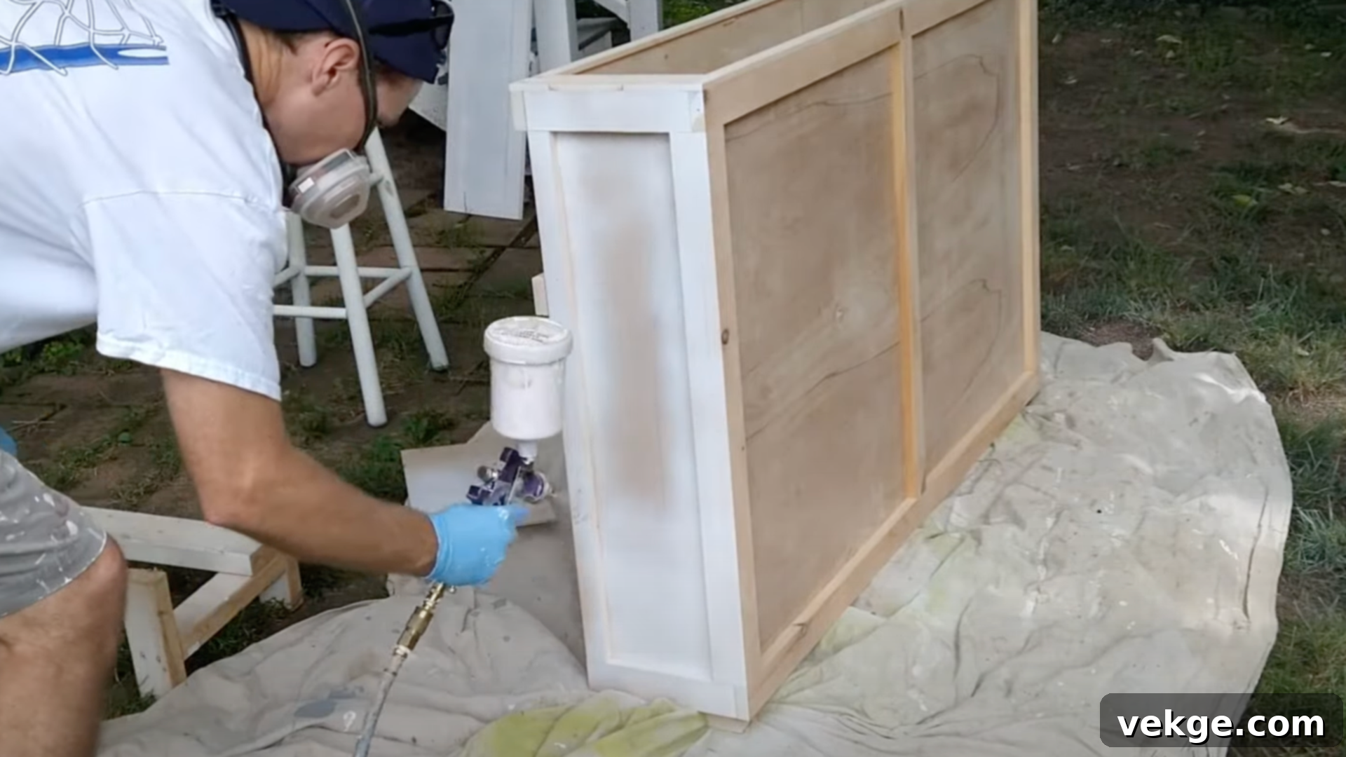 Sanding and painting the custom TV lift cabinet