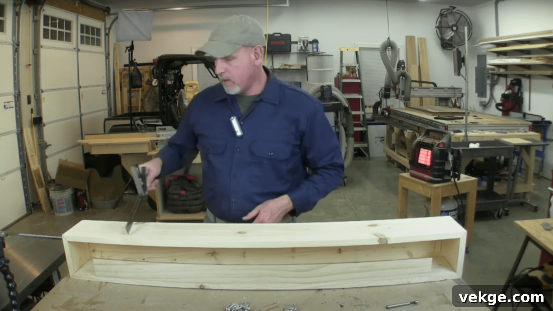 Distressing a wood beam with tools for a rustic, aged finish