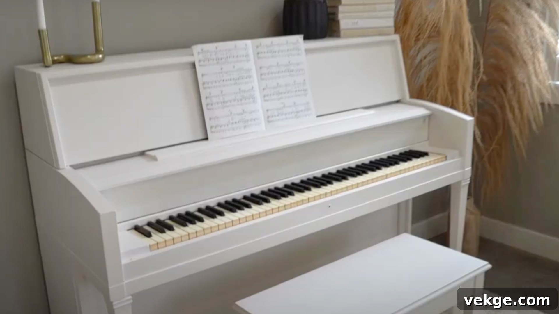 Carefully remove masking tape as paint dries, allow the piano to fully cure, and protect it from dust during the drying period.