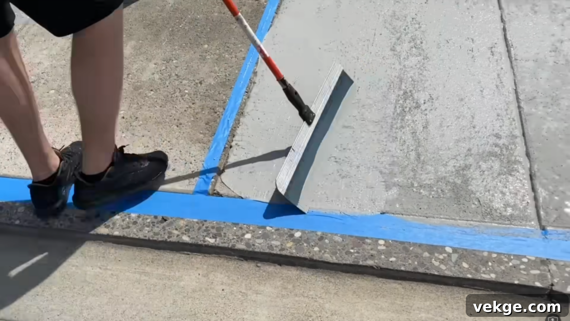 Applying multiple coats of concrete overlay: scratch, leveling, and broom finish.