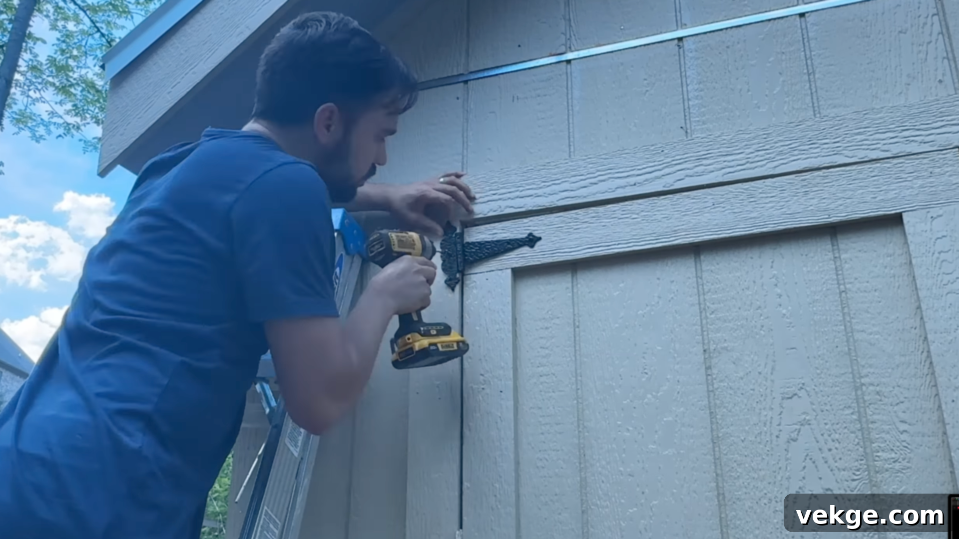 Step_8_Paint_and_Final_Touches - Painting the exterior of an 8x12 shed and completing final landscaping