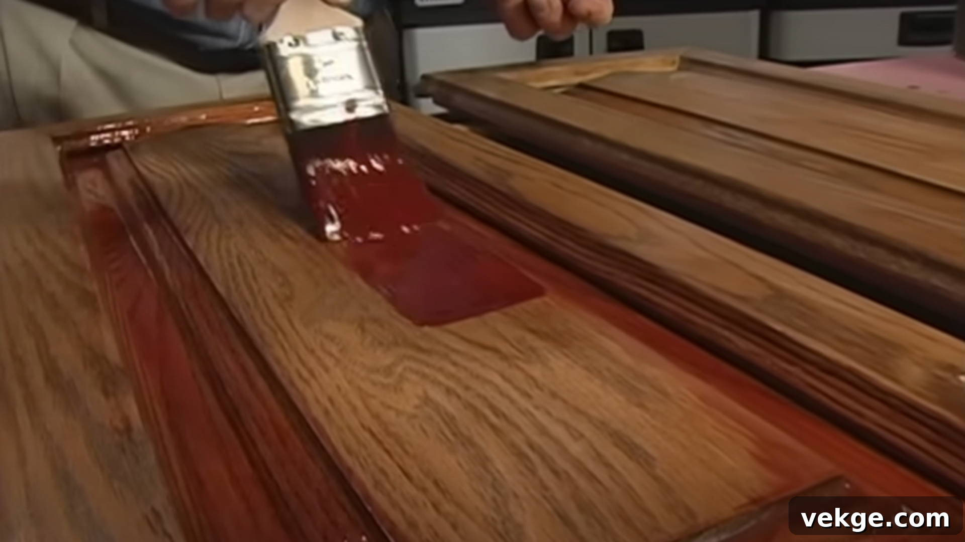 Carefully apply the stain and polyurethane finish to your cabinets using smooth, even strokes