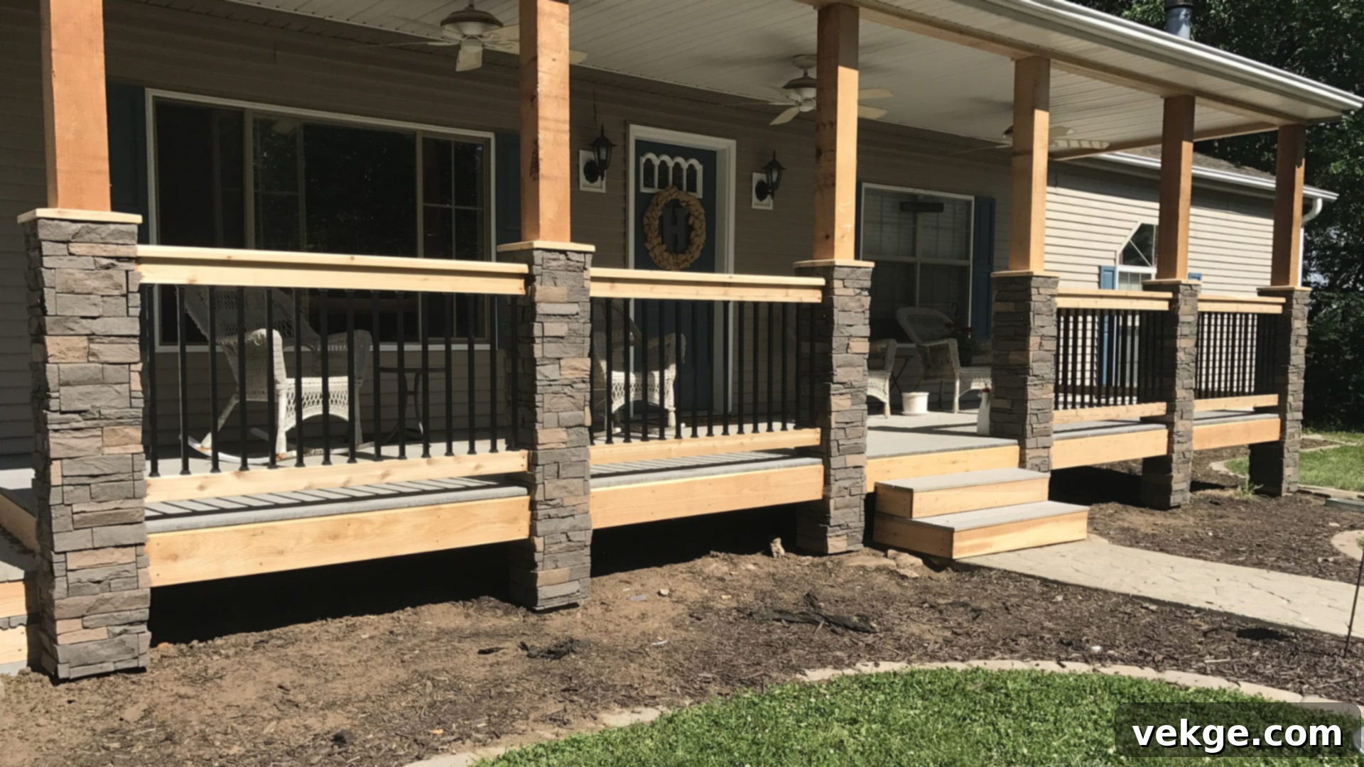 Stacked Stone Columns: Sturdy, architecturally defined columns crafted from stacked stone, supporting a porch roof and adding a traditional, robust look.