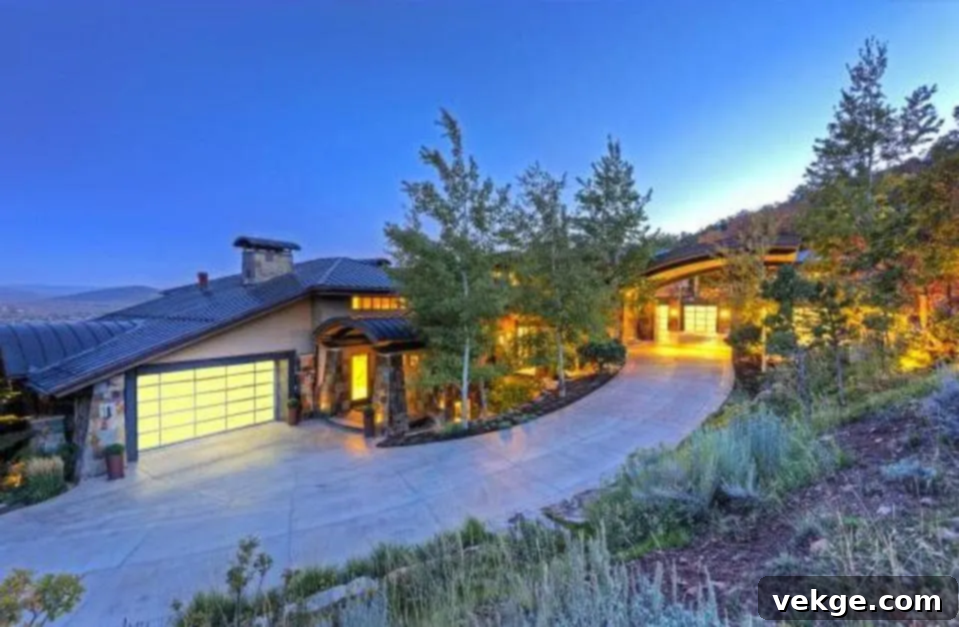Michael Jordan's luxurious vacation home in Park City, Utah, featuring a stone walkway and glass door