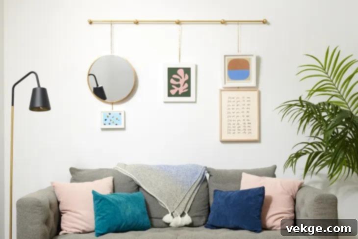 Small brass label holders with micro-stories under gallery wall frames