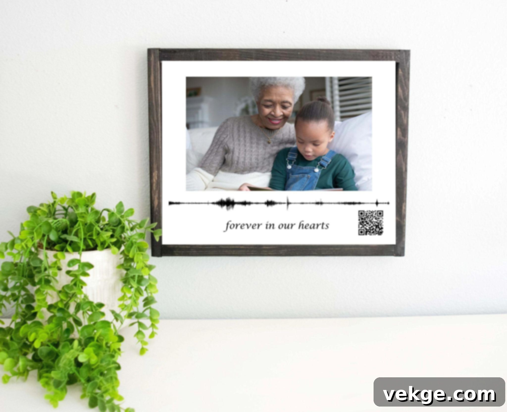 Gallery wall frame with a QR code linking to an audio memory