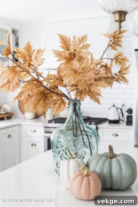 Fall flowers with pumpkins