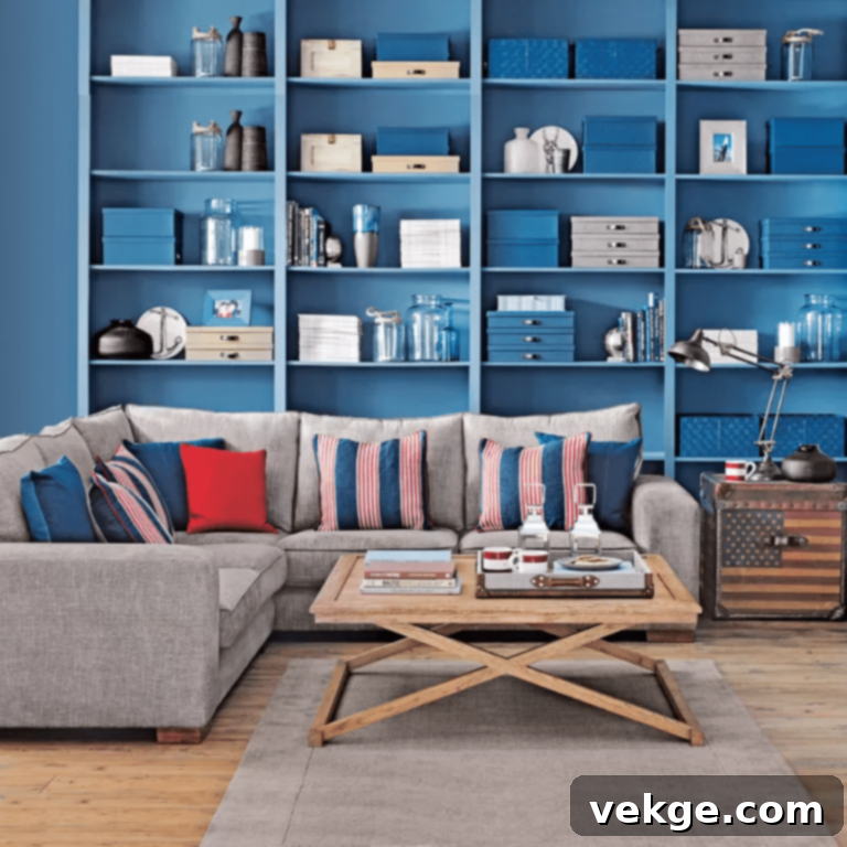 Coastal living room with blue-themed shelving, a corner sofa, and natural textures