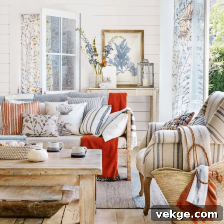 Coastal living room with sun-bleached hues, floral curtains, and beach-themed decor