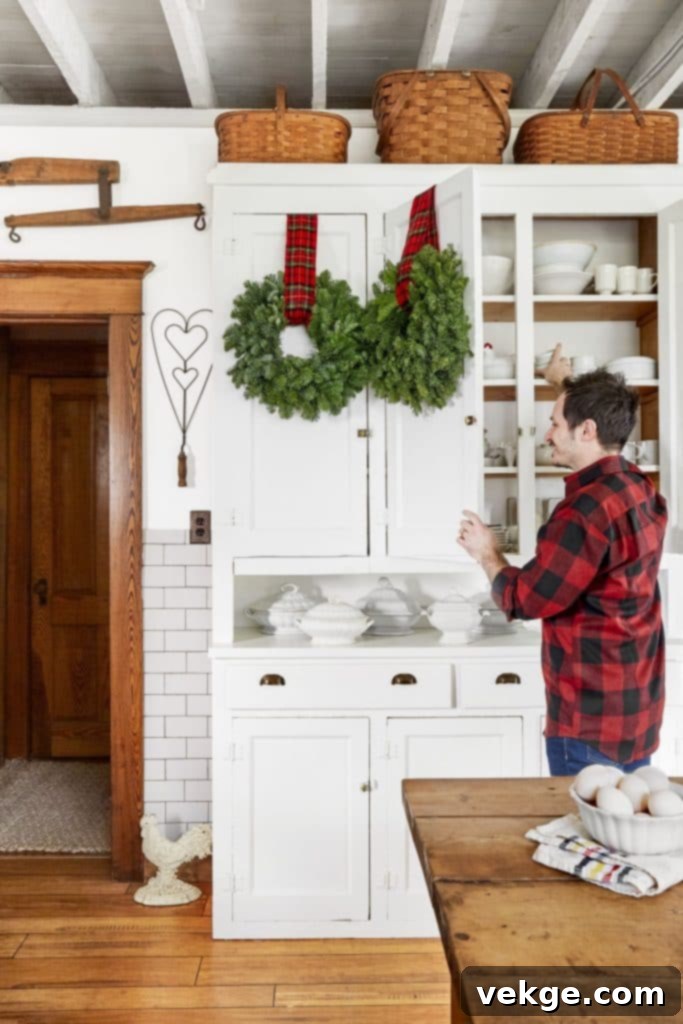 Christmas kitchen decorations wreaths on cupboards