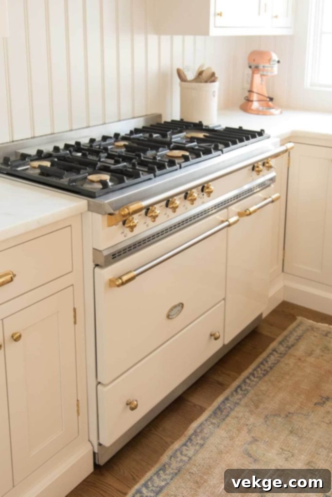 Lacanche range with brass knobs in a luxury kitchen