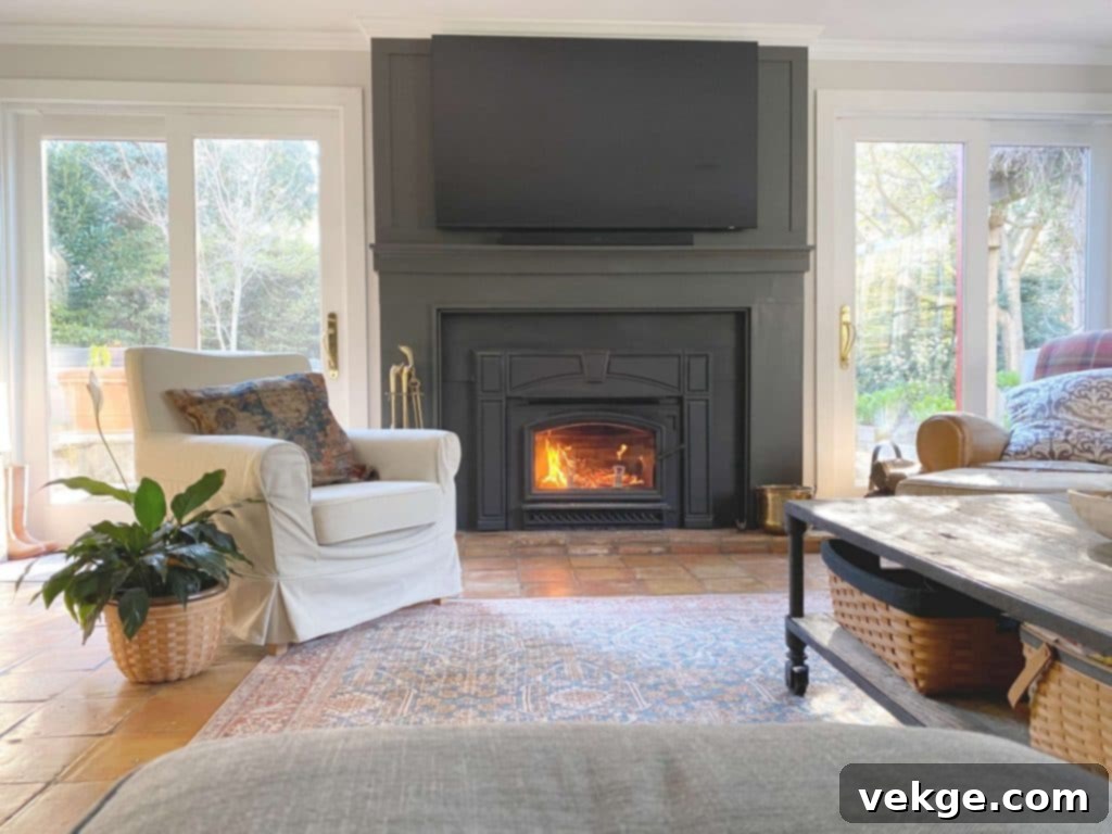 Fireplace makeover with black paint, disguising old features