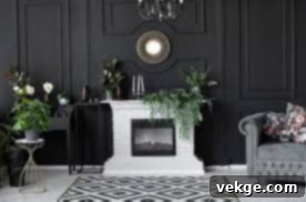 White fireplace contrasting beautifully with black walls