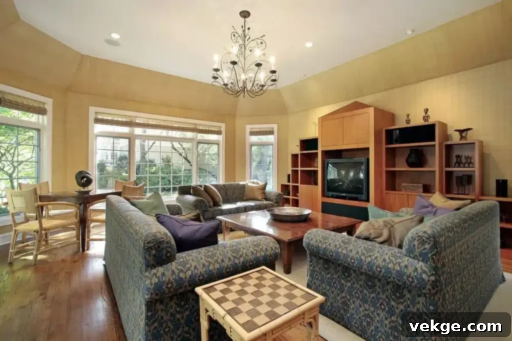 Elegant living room with a smooth cove ceiling
