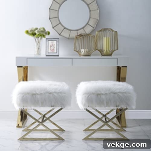 classic glam bedroom with square ottoman and traditional wall mirror