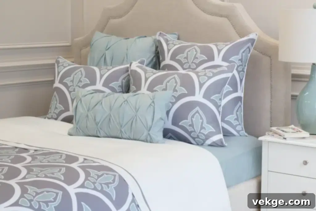 chic bedroom with solid square shams and pattern pillows