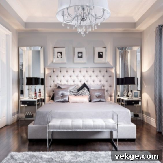 glam bedroom with mirrored nightstands and chandelier