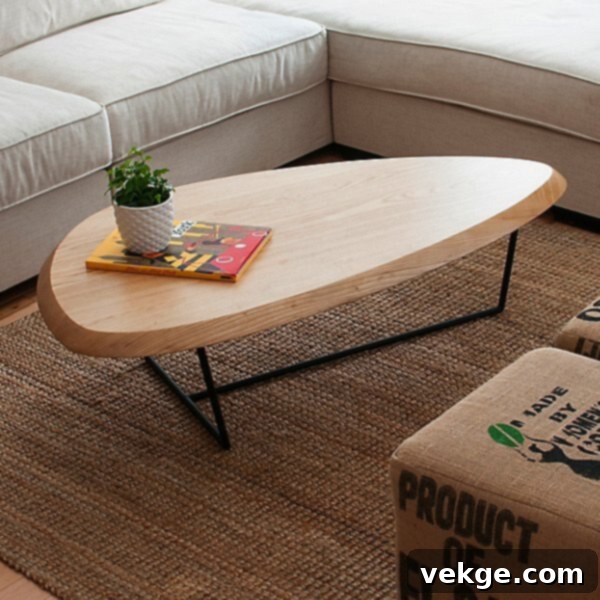 Metal and Wood Coffee Table with Light Wood Top Oval Shape Organic