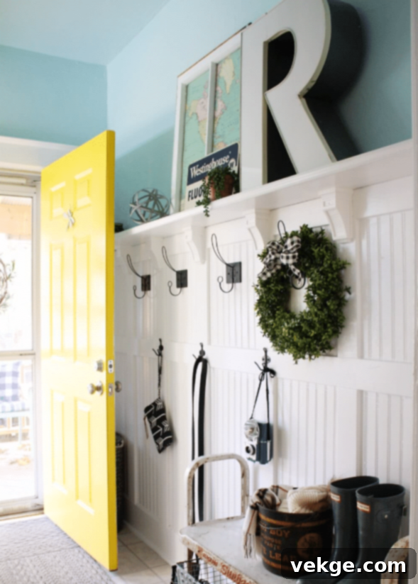 Country Coat Room With Wood Panels and Hooks