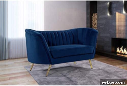 Contemporary Navy Plush Velvet Sofa with Gold Accents for Beach House Living Room