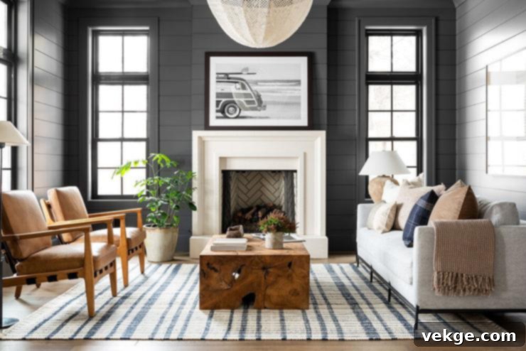 white limestone-fireplace-on black-wall