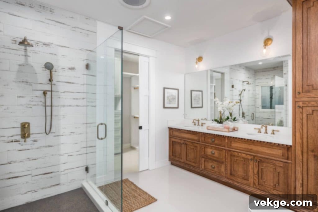 large bathroom with carved wood cabinets and shower