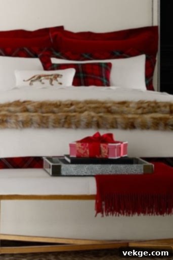 Christmas bedroom with classic red tartan bedding and faux fur