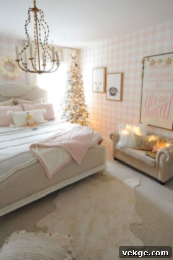 Christmas bedroom with a pretty pink palette and string lights