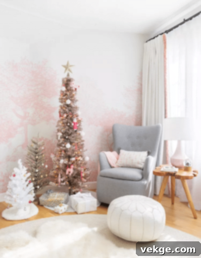 Christmas nursery decor with faux trees in matching tones