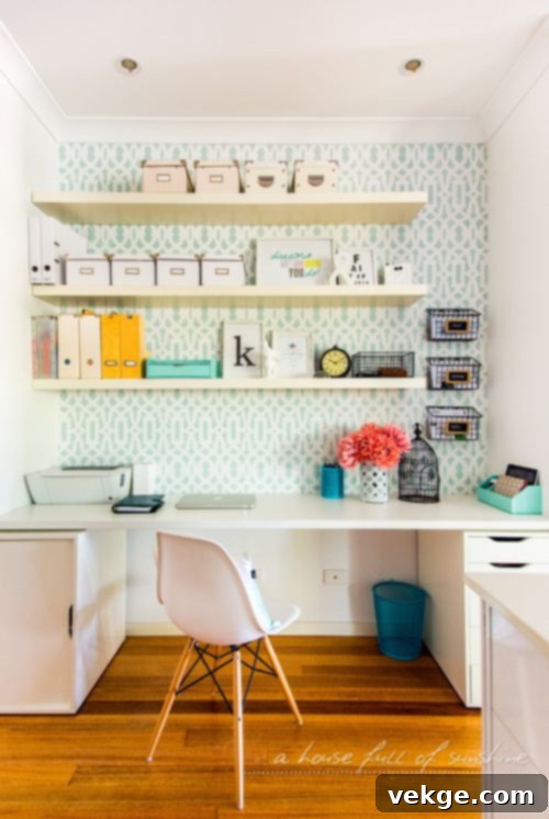 Feminine home office with a pastel built-in desk and bookshelves