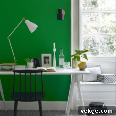 Feminine home office with a distinct solid colored accent wall